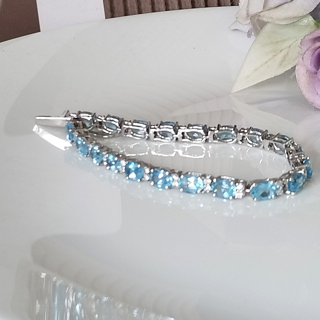 Blue topaz tennis bracelet, 14k white gold bracelet
